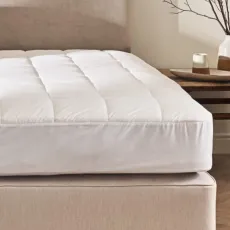 Vispring Skirted wool mattress protector close up